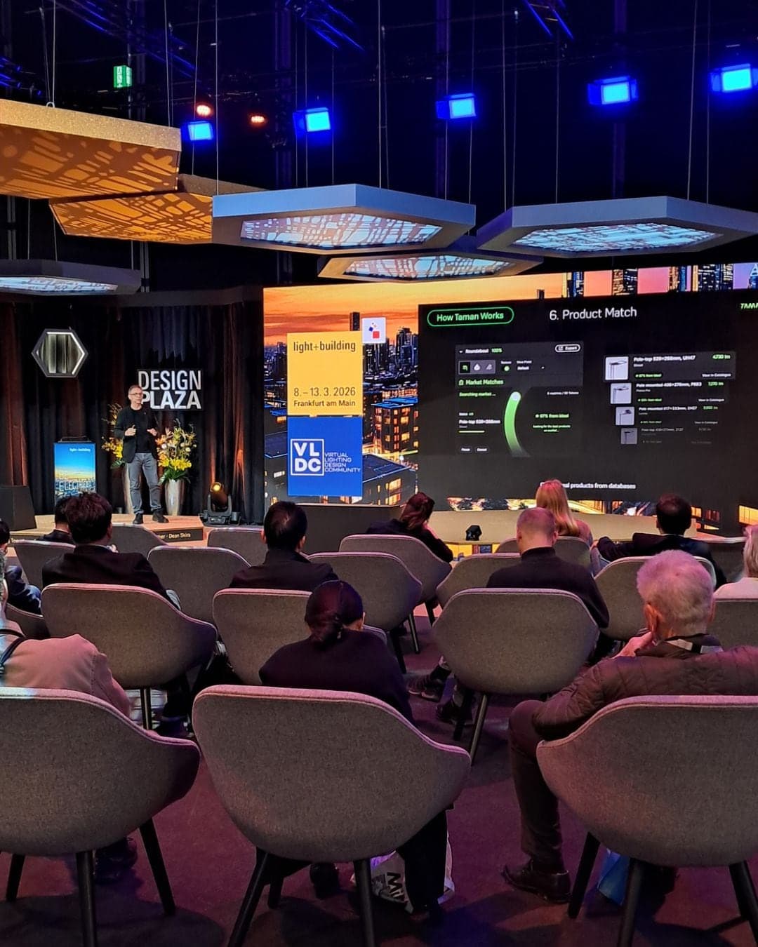 Audience at the Future Forum watching the “How Taman Works - Product Match” slide